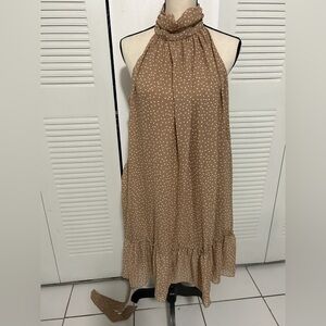 Beige summer dress with white dots.